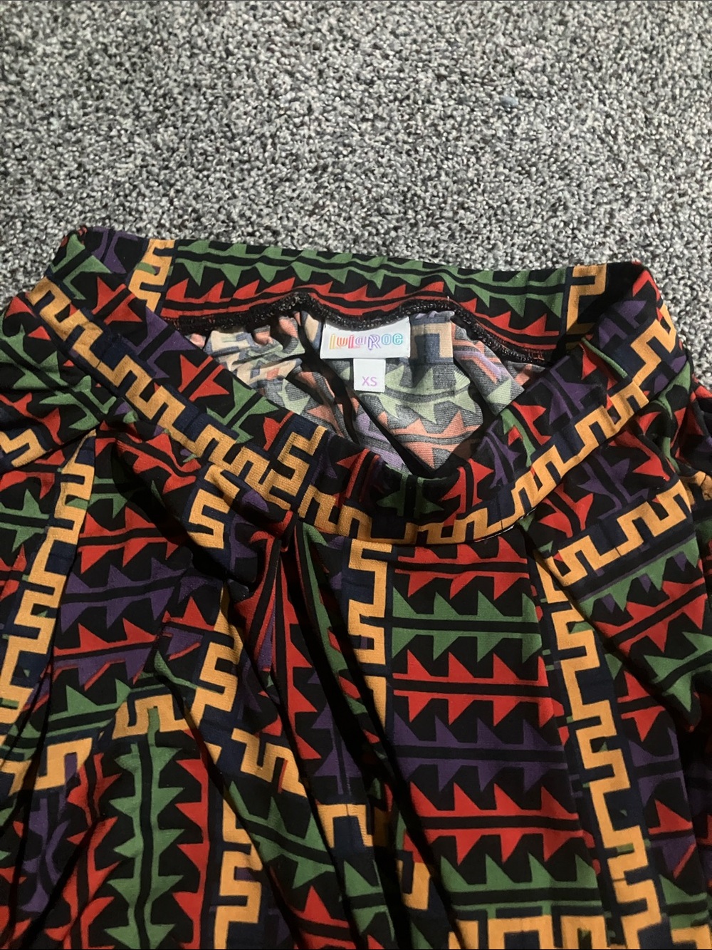 LuLaRoe Midi Skirt in Black with Red, Green, Purple & Gold Geometric Print